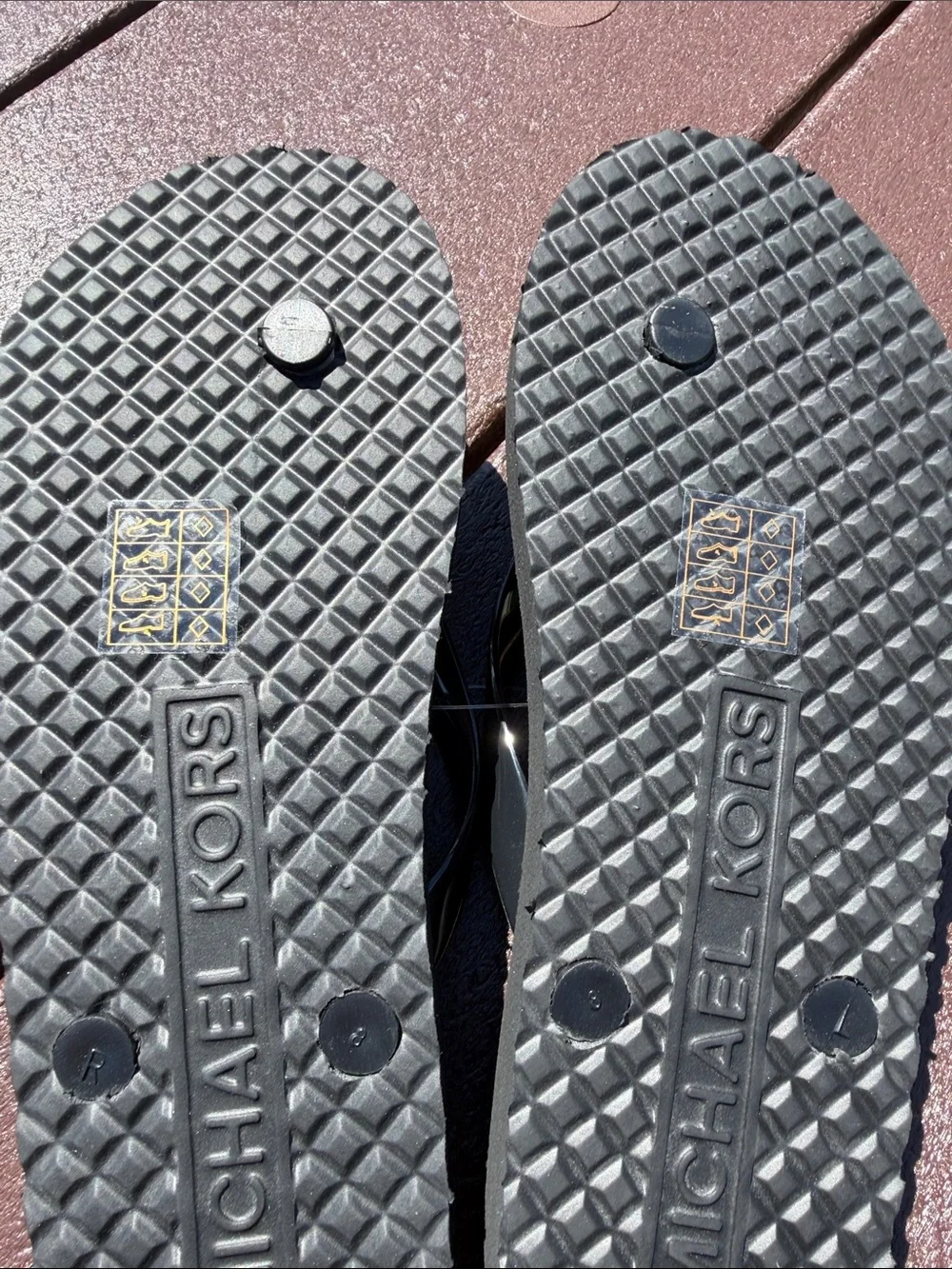 Michael Kors Black and Gray Logo Jelly Flip Flops